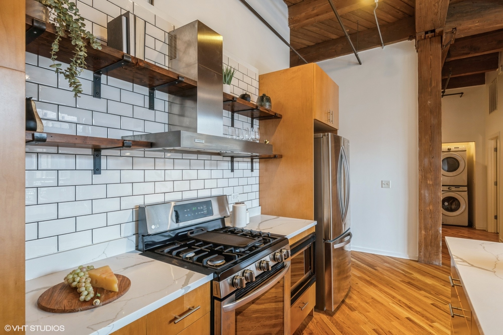 1040 West Adams Street, Unit 442 Chicago, IL 60607 - Photo 11 of 23 a stove top oven sitting inside of a kitchen