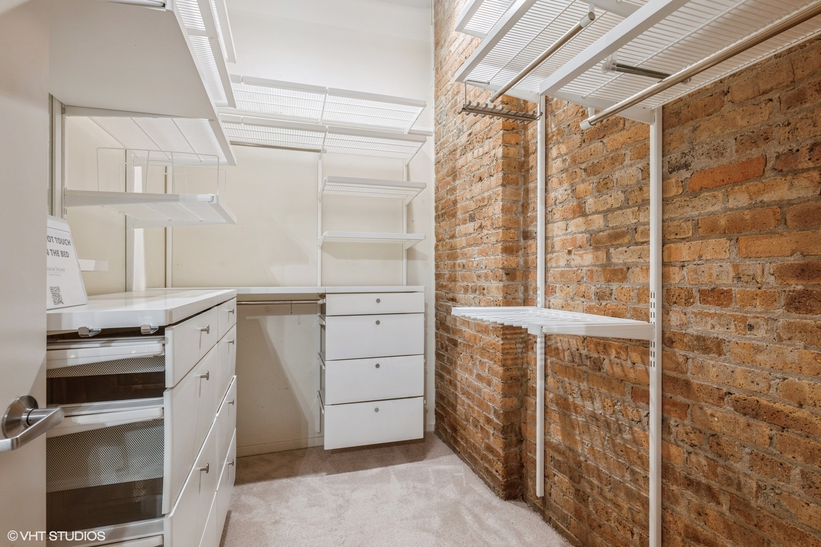 1040 West Adams Street, Unit 442 Chicago, IL 60607 - Photo 17 of 23 a view of walk in closet