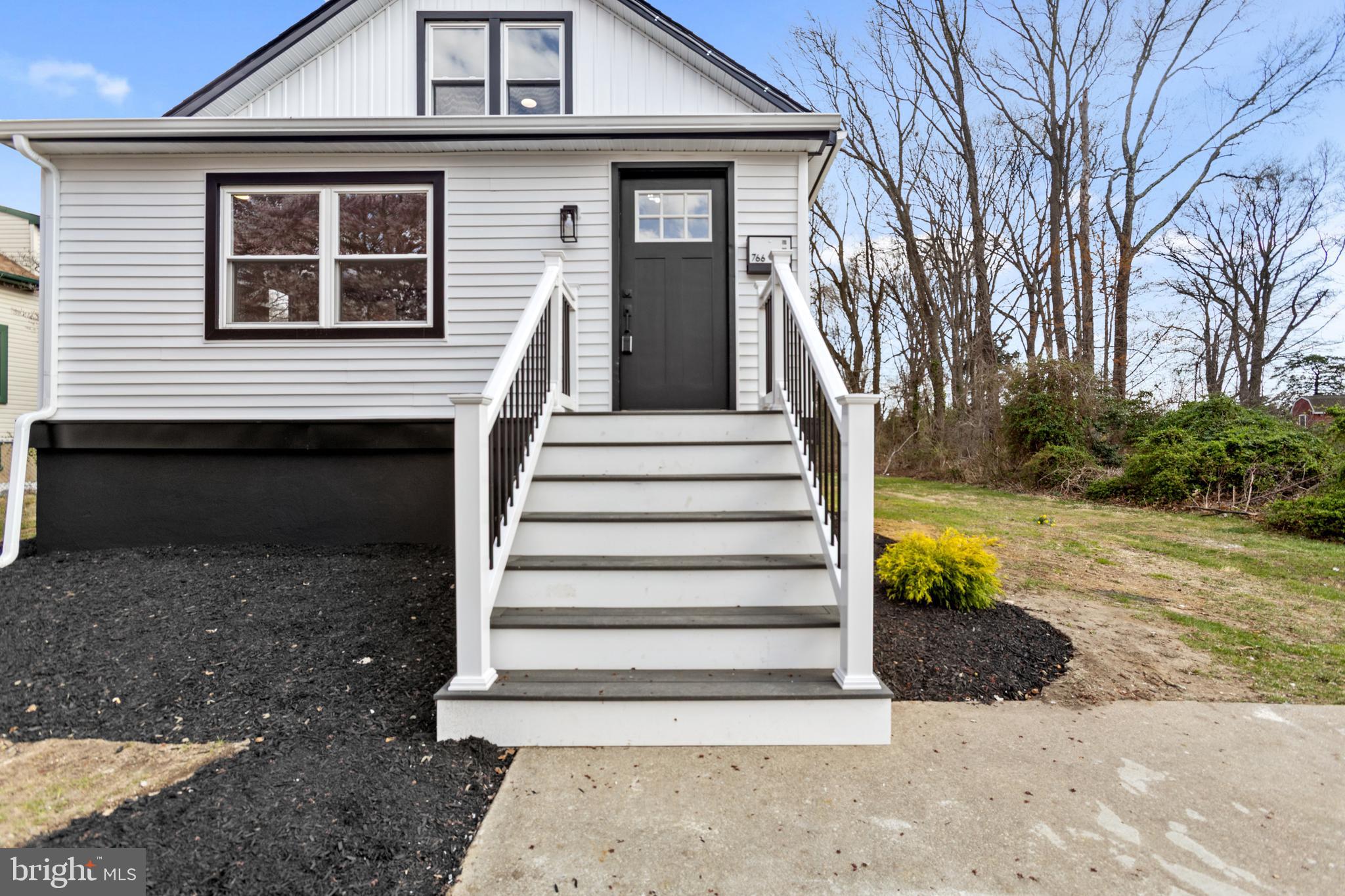 766 Highland Road Deptford, NJ 08096 - Photo 3 of 41 a view of a house with a yard