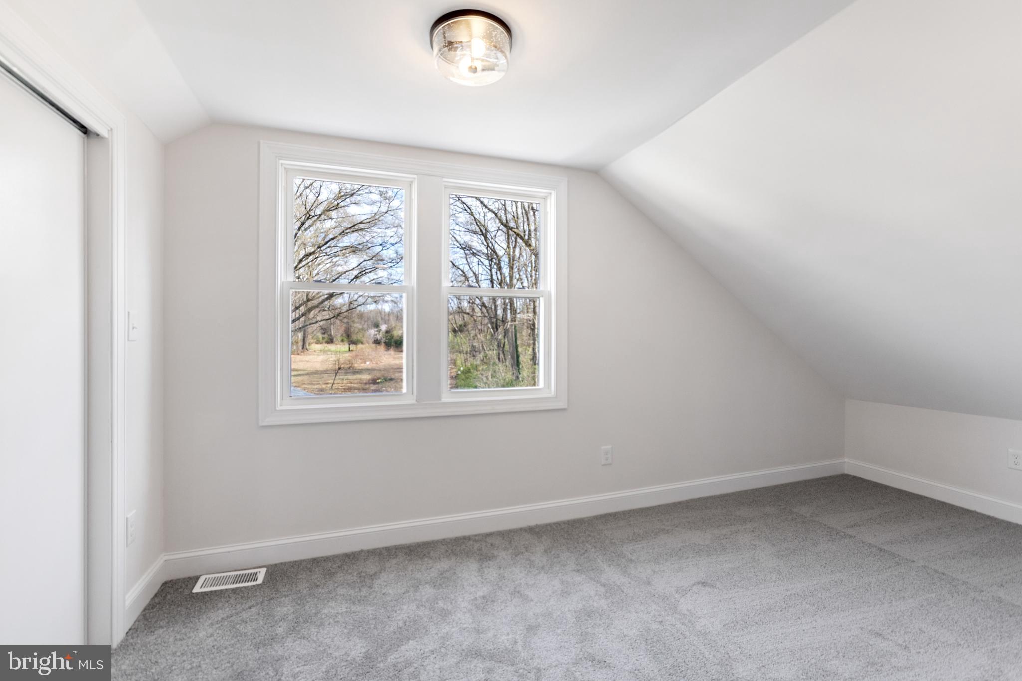 766 Highland Road Deptford, NJ 08096 - Photo 31 of 41 an empty room with a window
