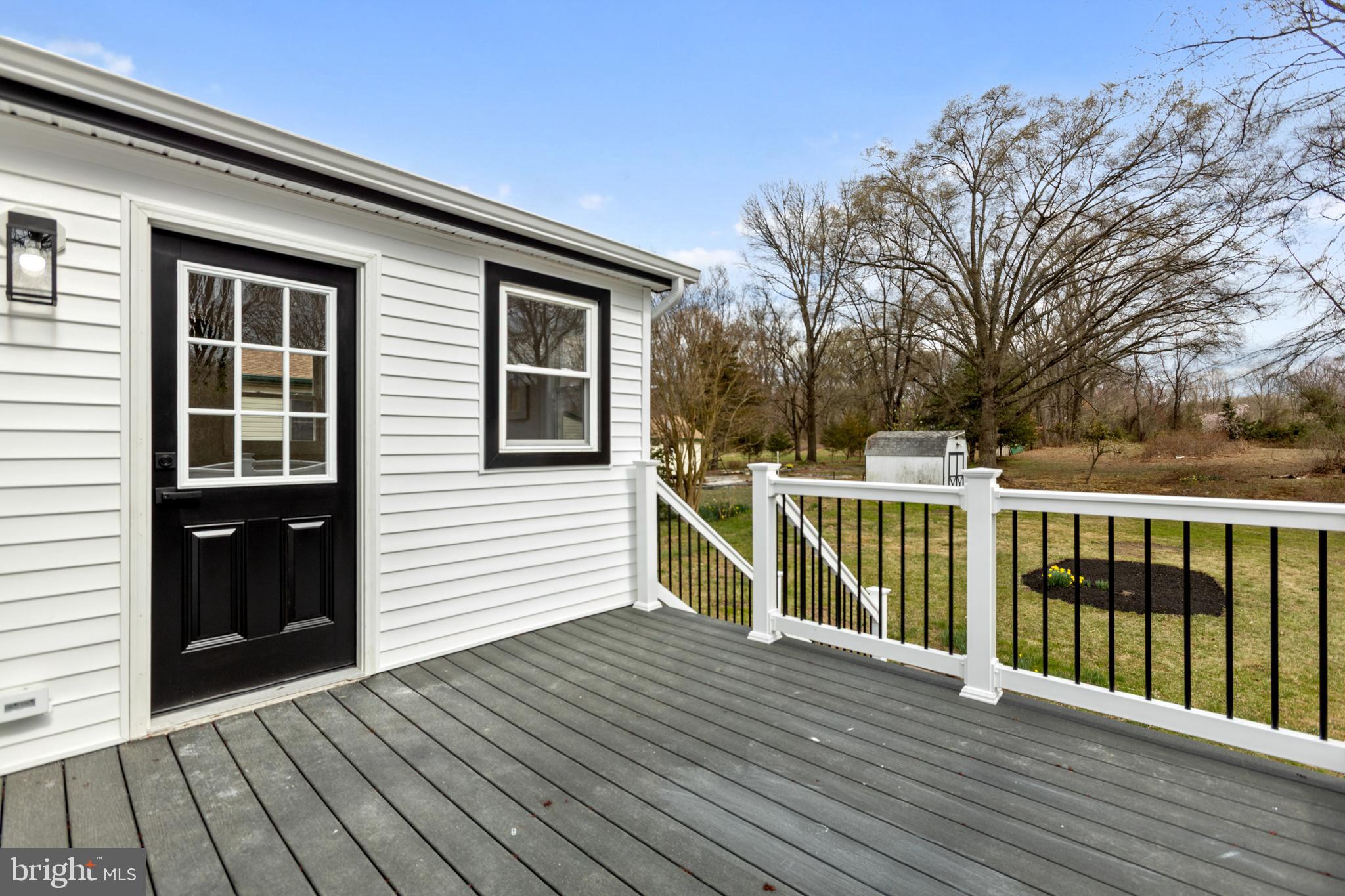 766 Highland Road Deptford, NJ 08096 - Photo 34 of 41 a view of a balcony with wooden floor and fence