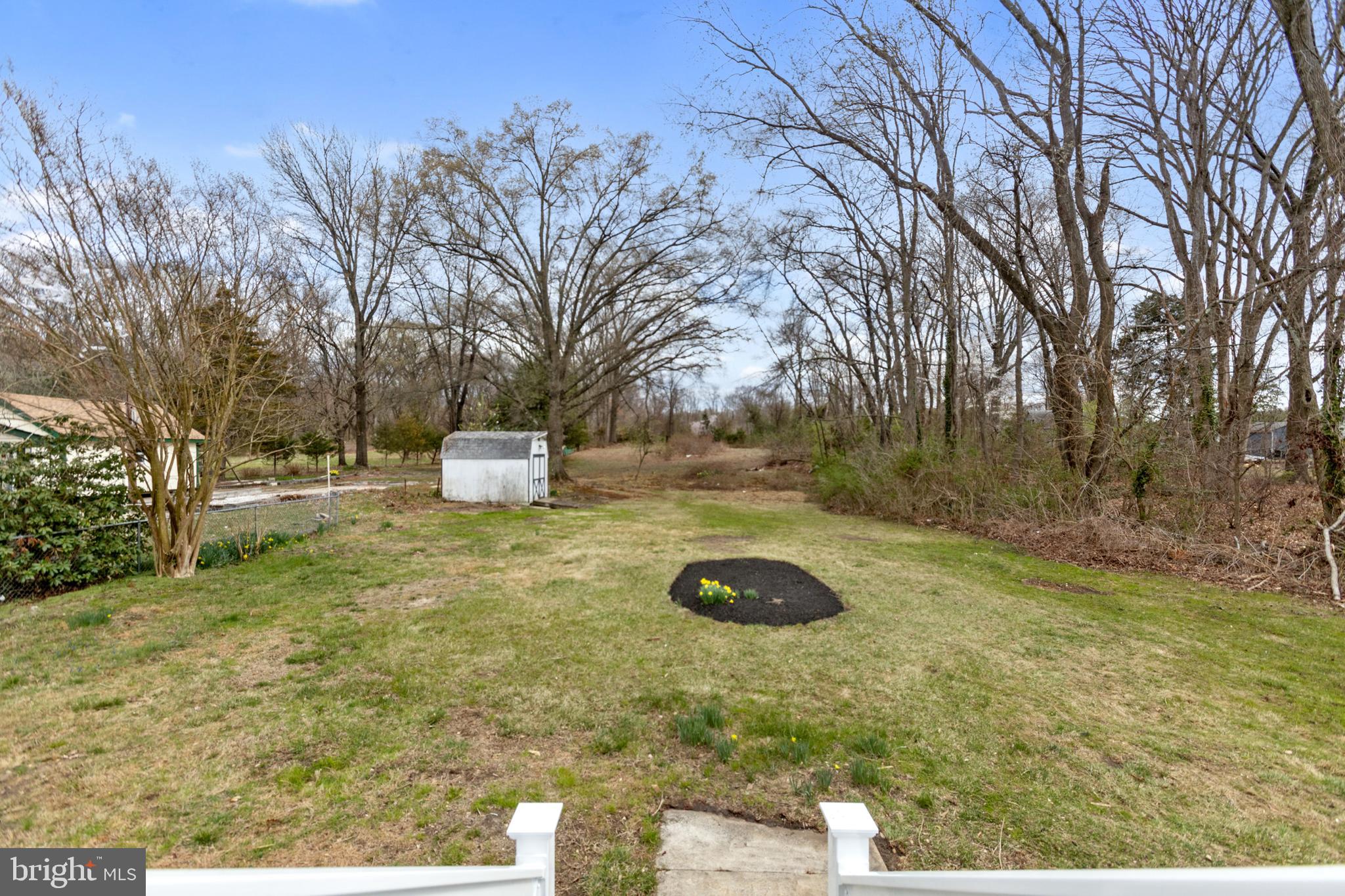 766 Highland Road Deptford, NJ 08096 - Photo 36 of 41 a backyard of a house with lots of green space