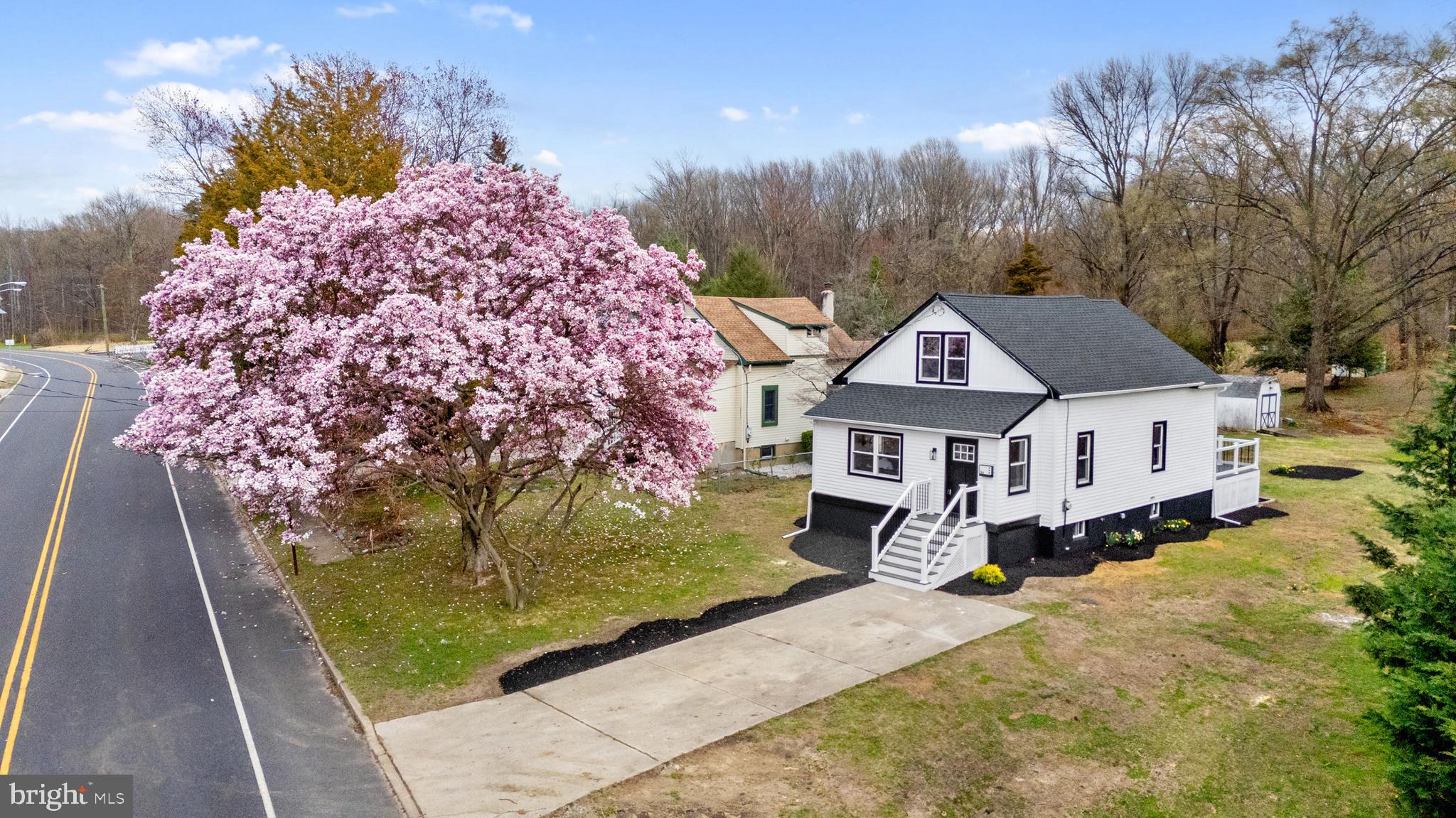 766 Highland Road Deptford, NJ 08096 - Photo 39 of 41 a front view of a house with a yard