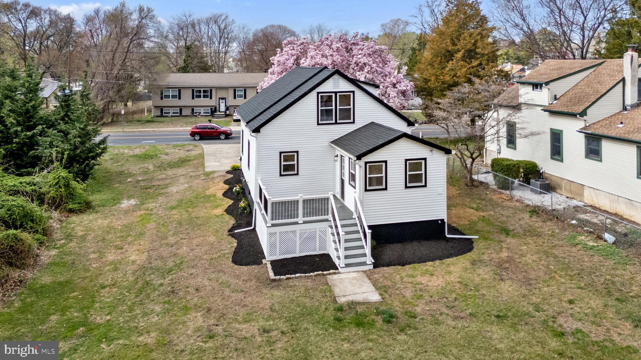 766 Highland Road Deptford, NJ 08096 - Photo 4 of 41 a front view of a house with a yard