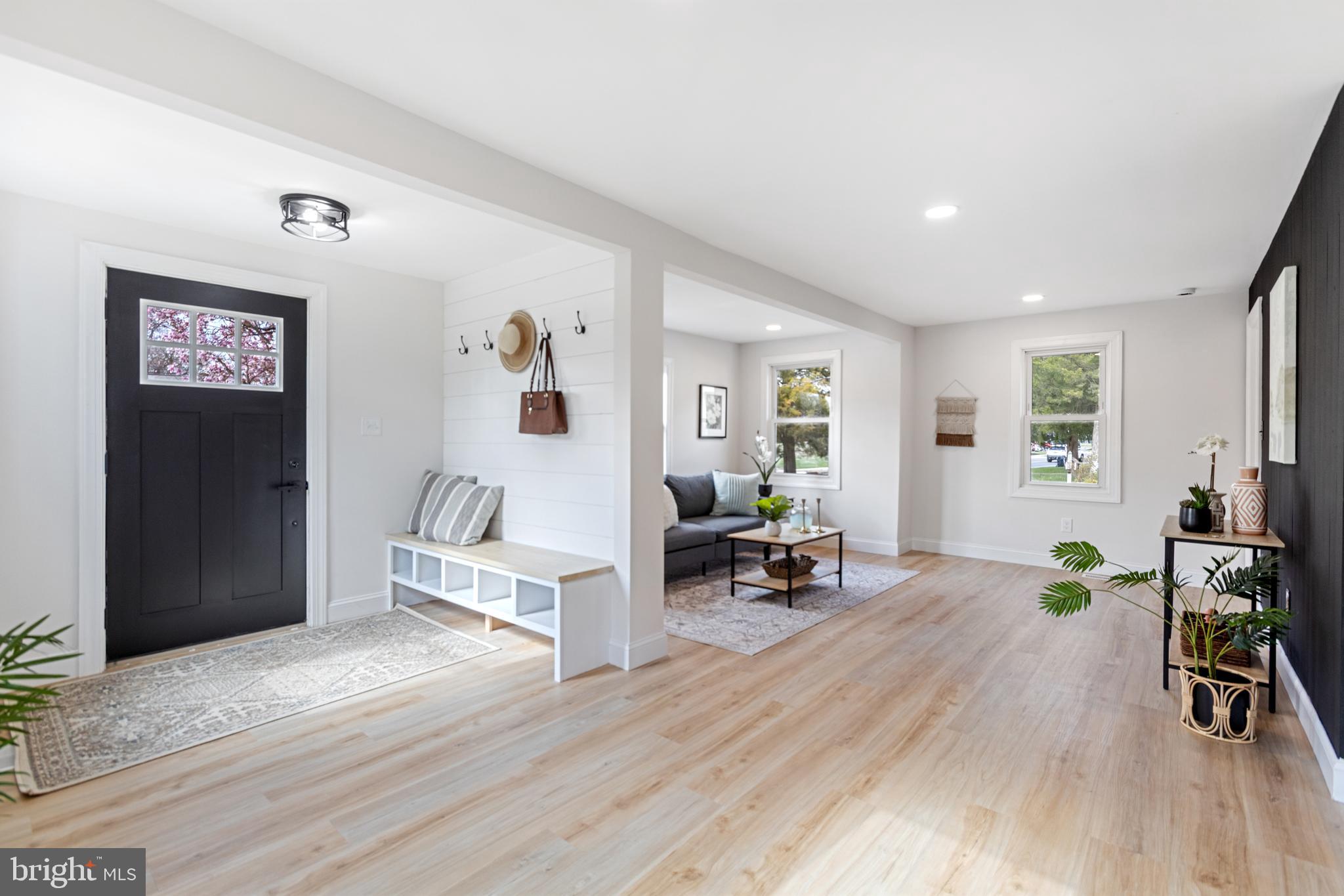 766 Highland Road Deptford, NJ 08096 - Photo 7 of 41 a living room with furniture and a wooden floor