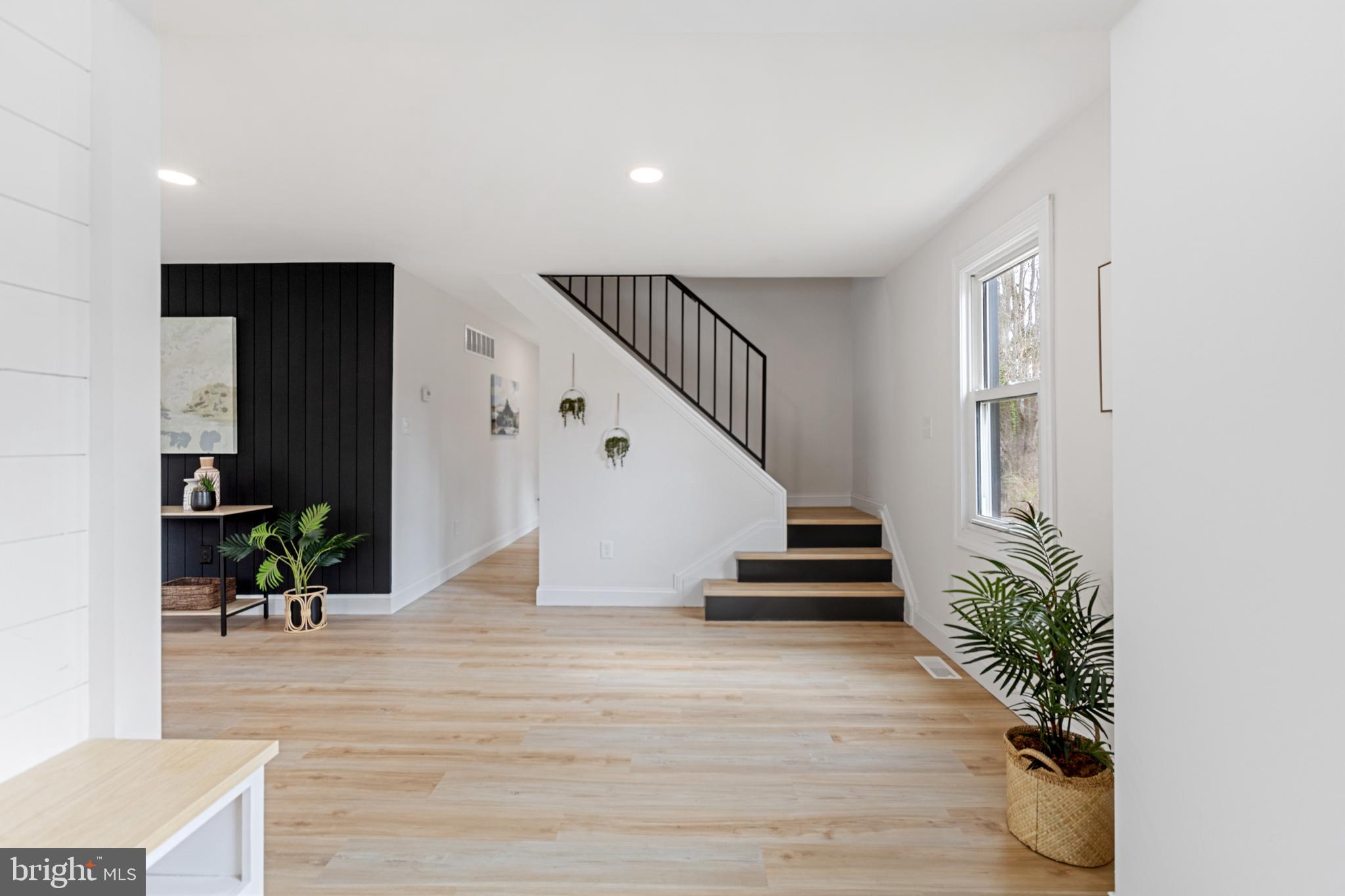 766 Highland Road Deptford, NJ 08096 - Photo 8 of 41 a view of entryway and hall with wooden floor
