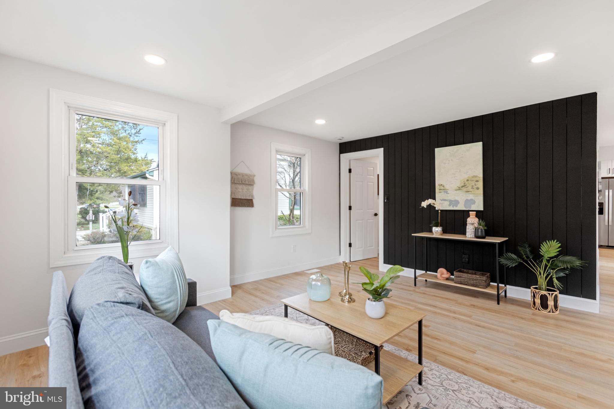 766 Highland Road Deptford, NJ 08096 - Photo 9 of 41 a living room with furniture and a window