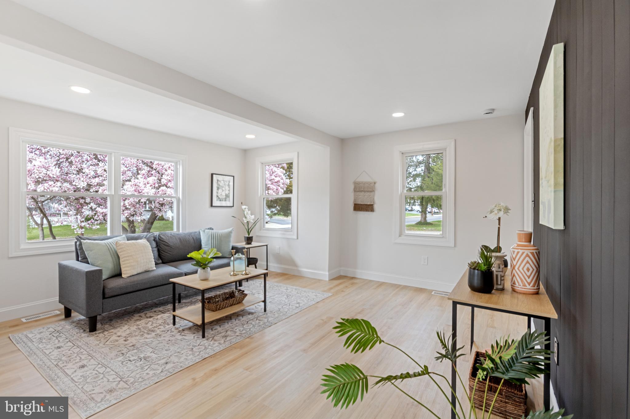 766 Highland Road Deptford, NJ 08096 - Photo 10 of 41 a living room with furniture and a potted plant