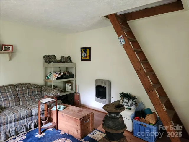 a living room with furniture and a couch
