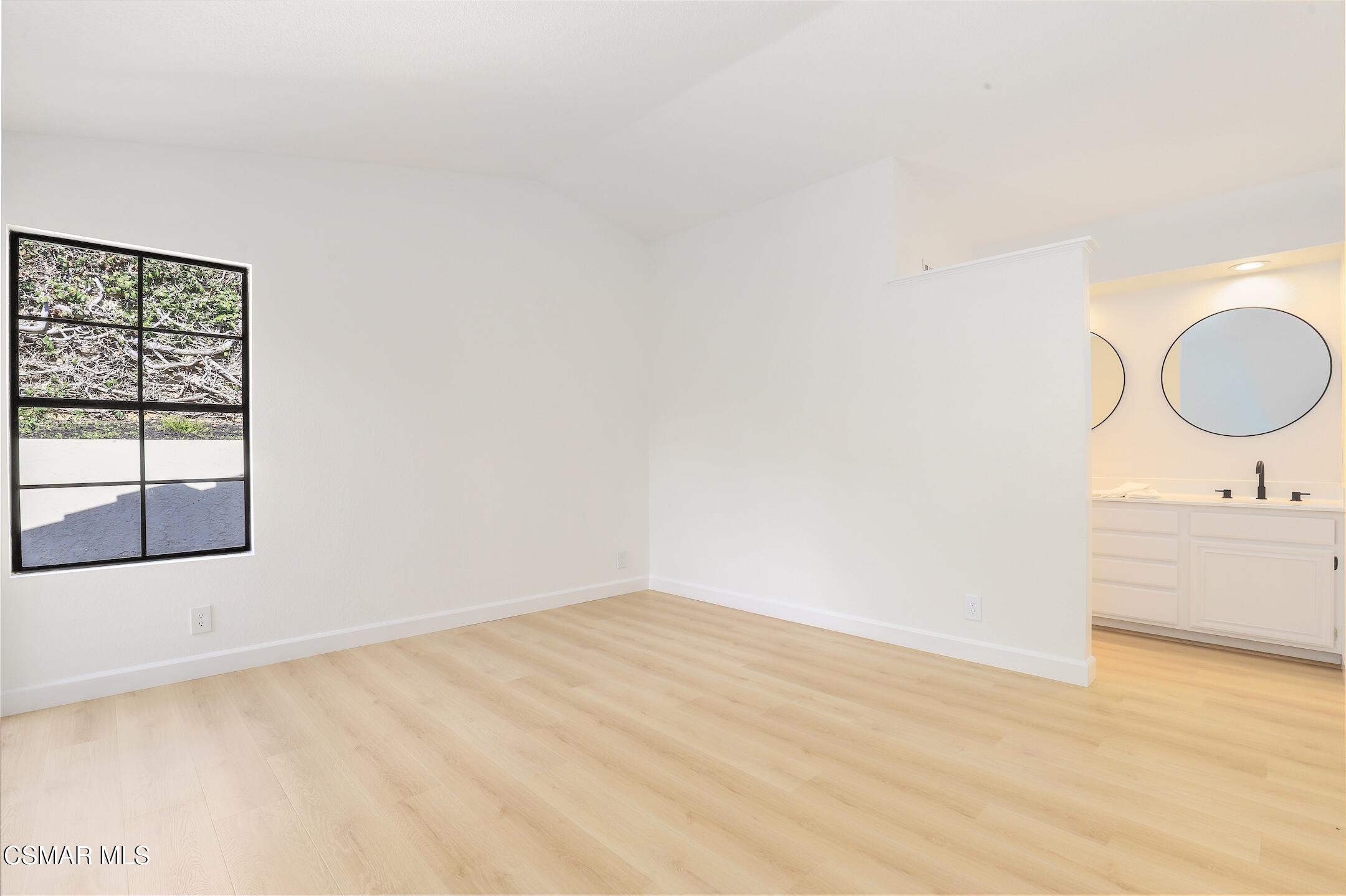 765 Congressional Road Simi Valley, CA 93065 - Photo 11 of 35 a bathroom with a sink and a window