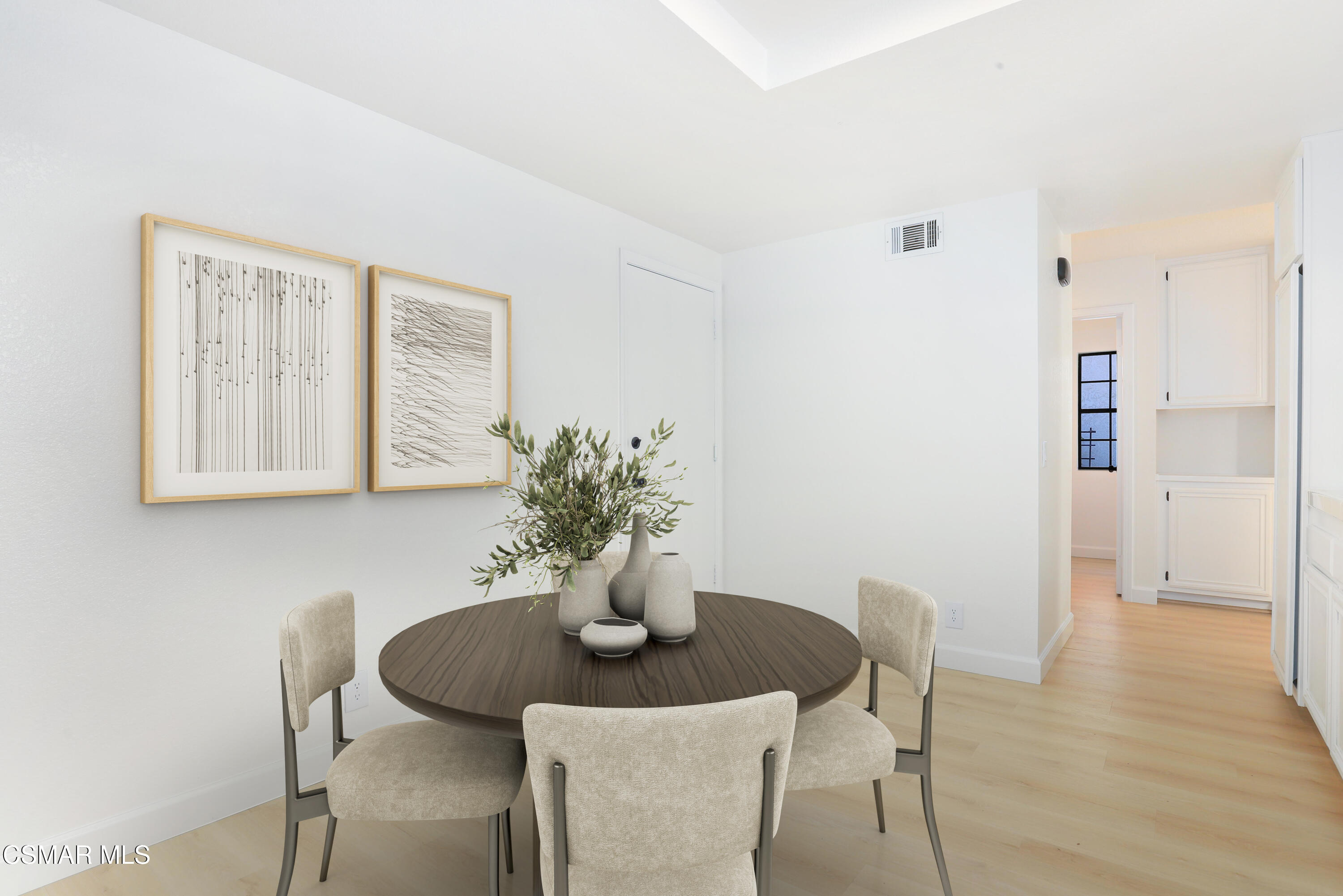 765 Congressional Road Simi Valley, CA 93065 - Photo 20 of 35 a view of a dining room with furniture and wooden floor