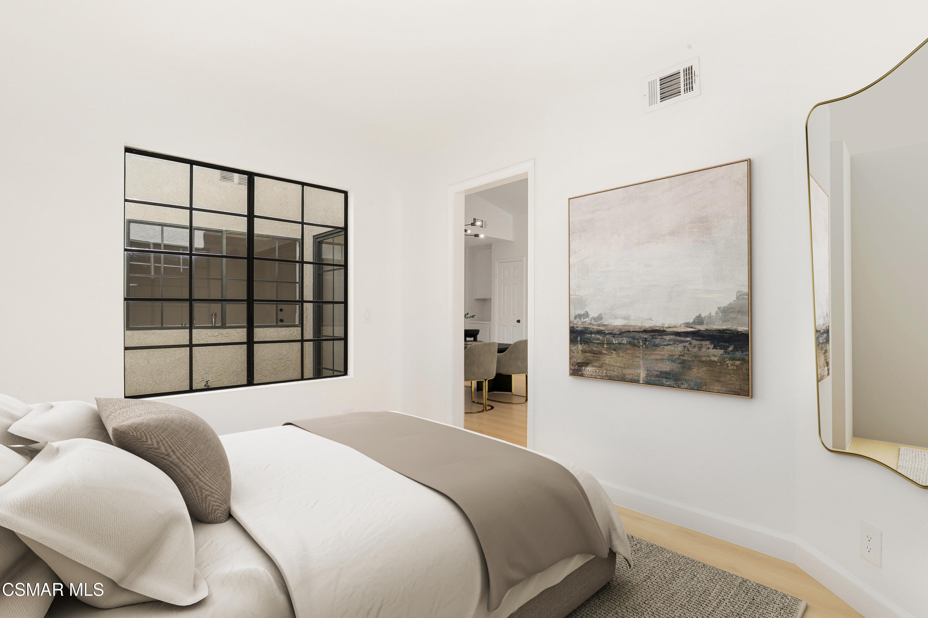 765 Congressional Road Simi Valley, CA 93065 - Photo 22 of 35 a bedroom with a large bed and a window