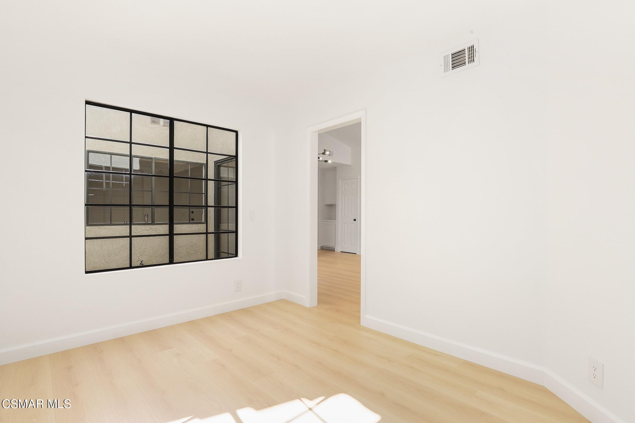 765 Congressional Road Simi Valley, CA 93065 - Photo 24 of 35 a view of an empty room with a window