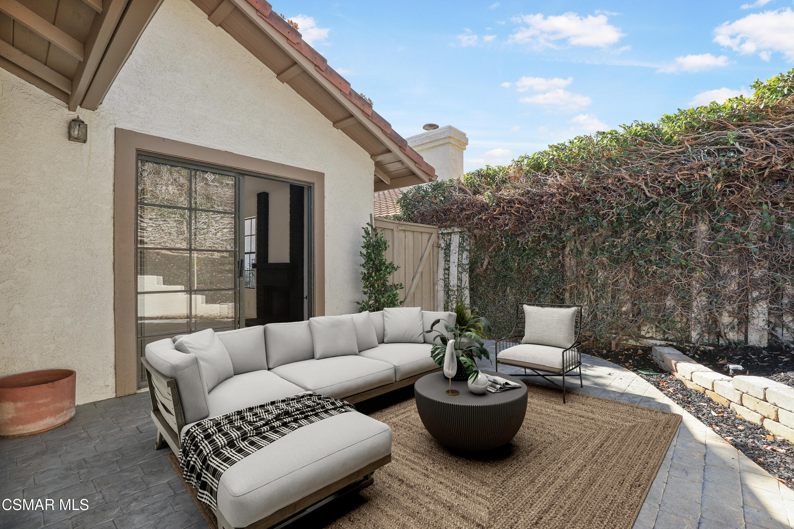 765 Congressional Road Simi Valley, CA 93065 - Photo 30 of 35 a living room with furniture and a potted plant