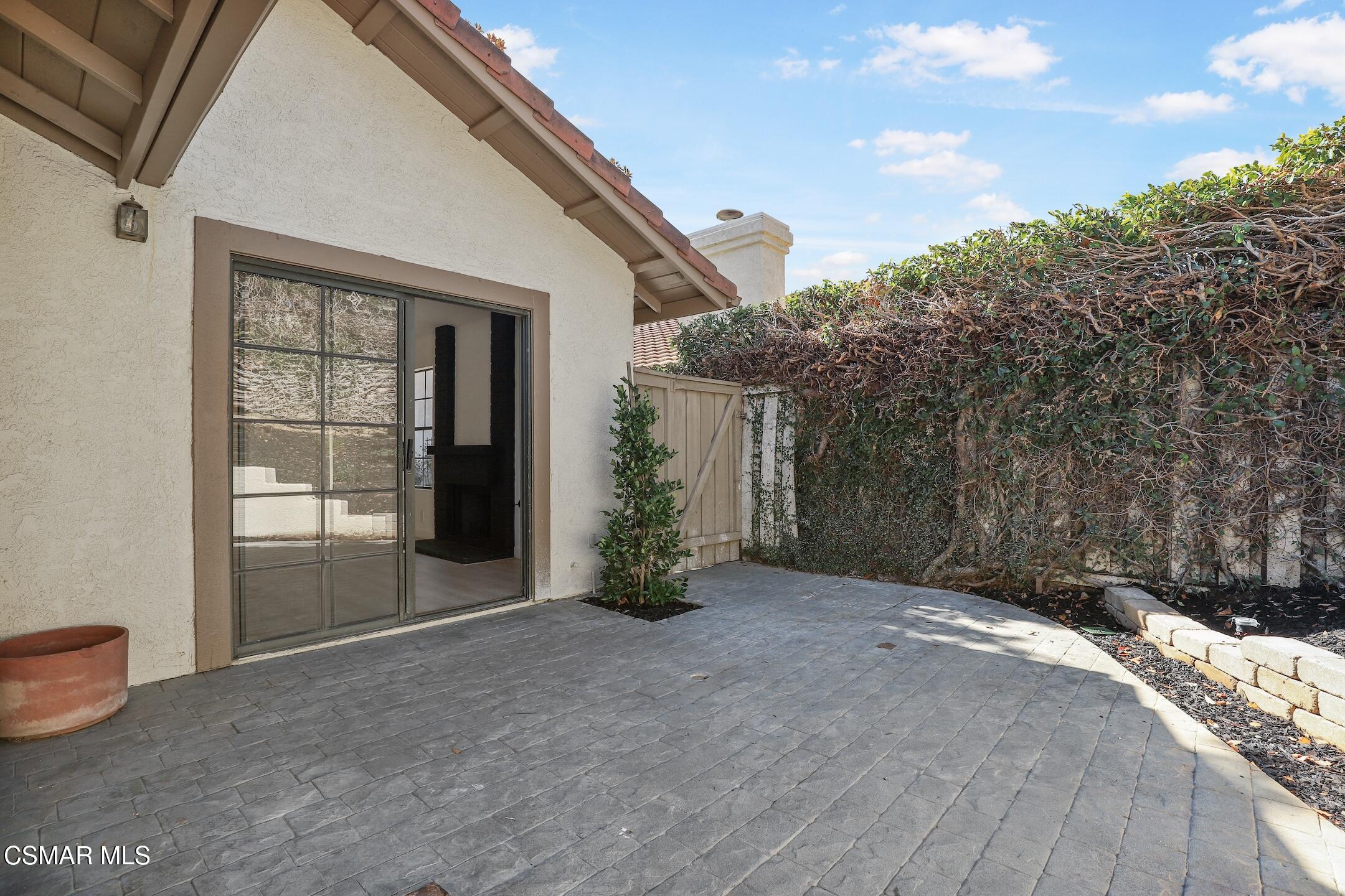 765 Congressional Road Simi Valley, CA 93065 - Photo 31 of 35 a view of a house with a backyard