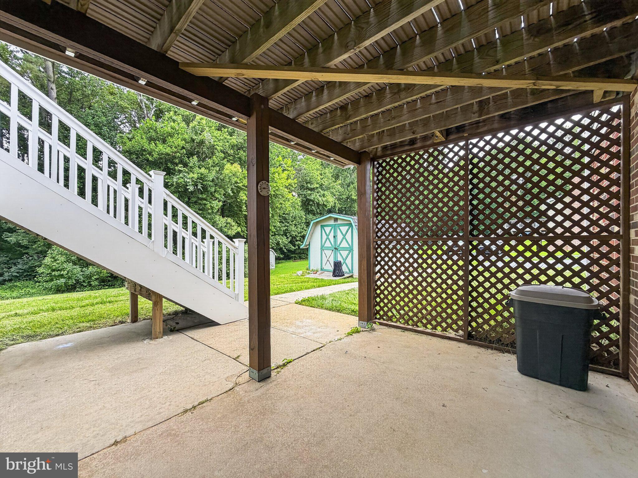 30075 Huntt Road Mechanicsville, MD 20659 - Photo 12 of 21 Charming outdoor space with greenery.