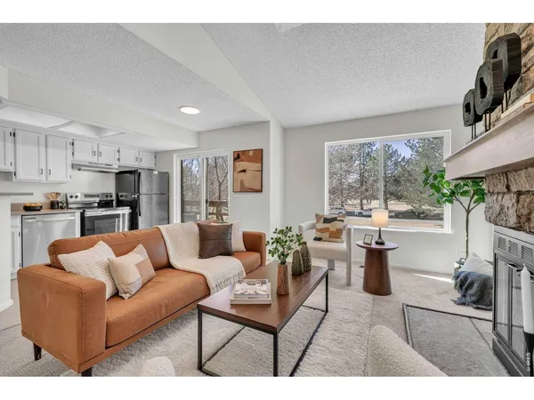 a kitchen with cabinets and stainless steel appliances
