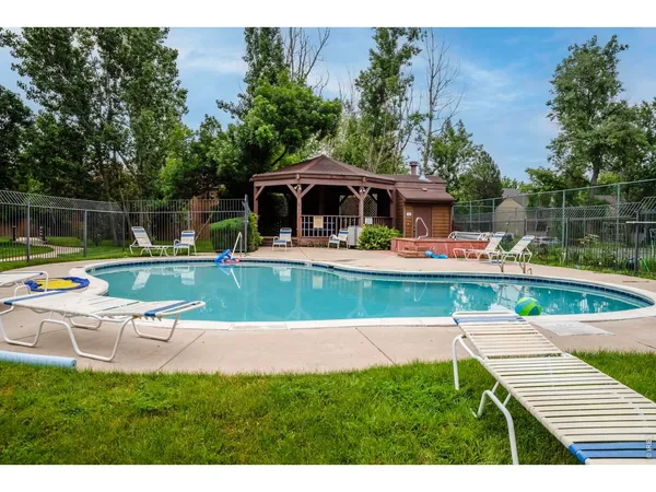 a view of a house with a swimming pool