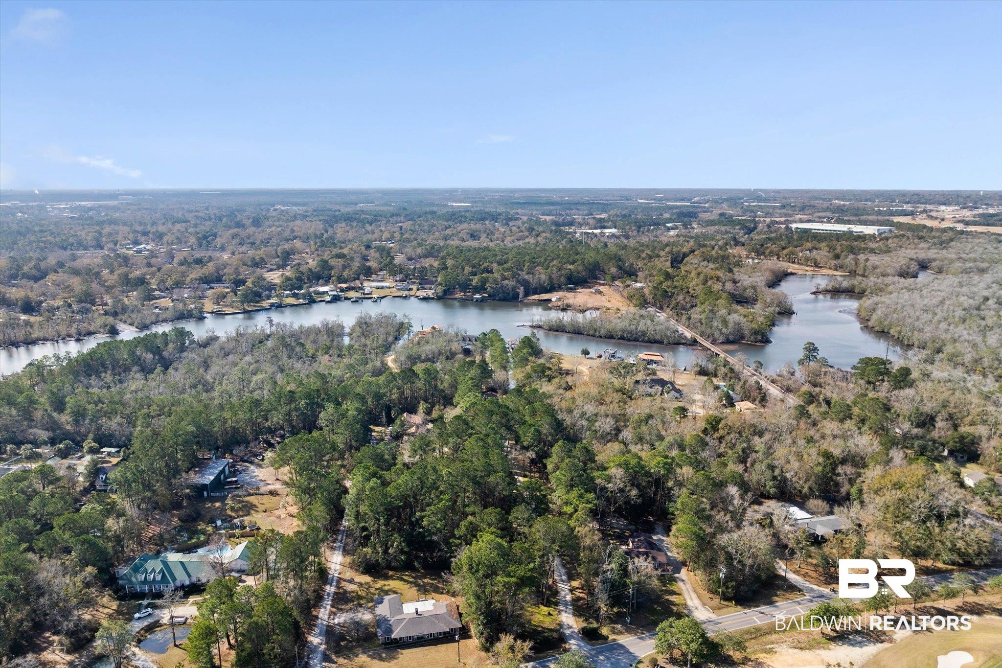 3847 Riviere Du Chien Road Mobile, AL 36693 - Photo 46 of 51 Aerial overview of property's location with a large body of water and a forest