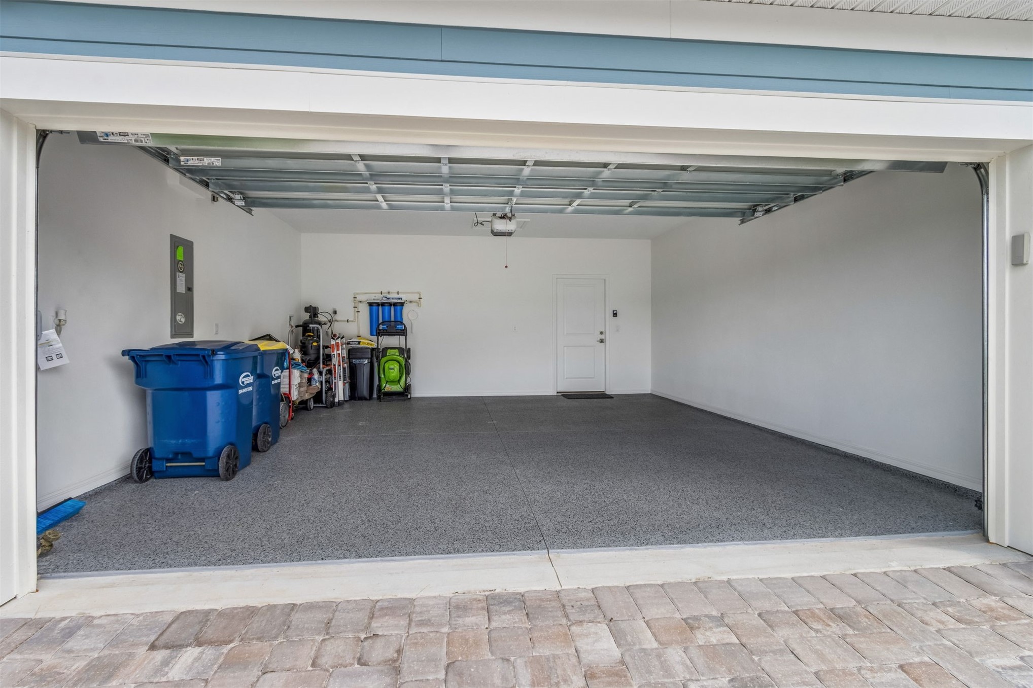 517 Continuum Loop Yulee, FL 32097 - Photo 40 of 88 2 car garage/epoxy floor