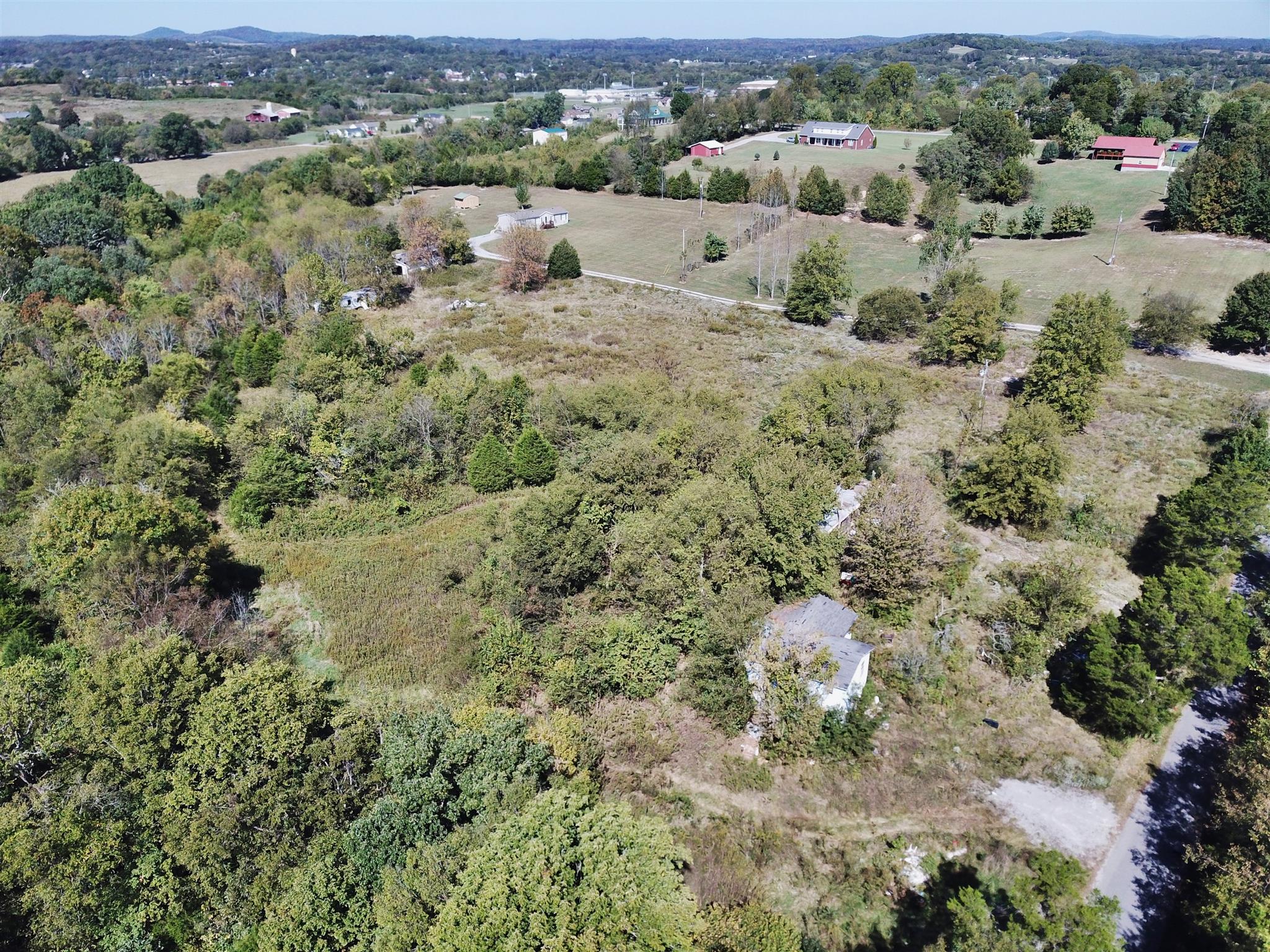 1230 Neal Road Watertown, TN 37184 - Photo 2 of 5 an aerial view of a houses with a yard