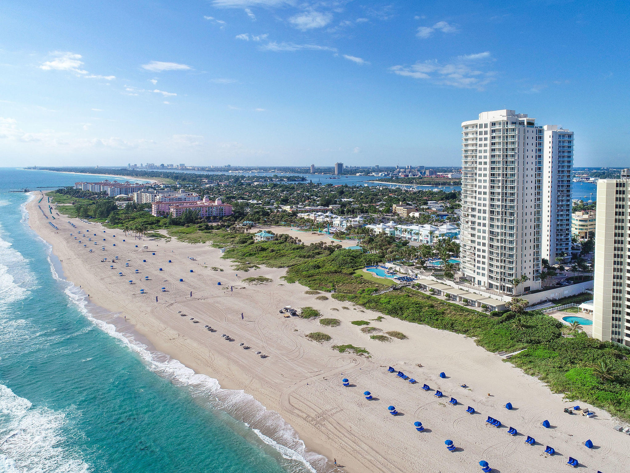 a view of a city with tall buildings in front of it