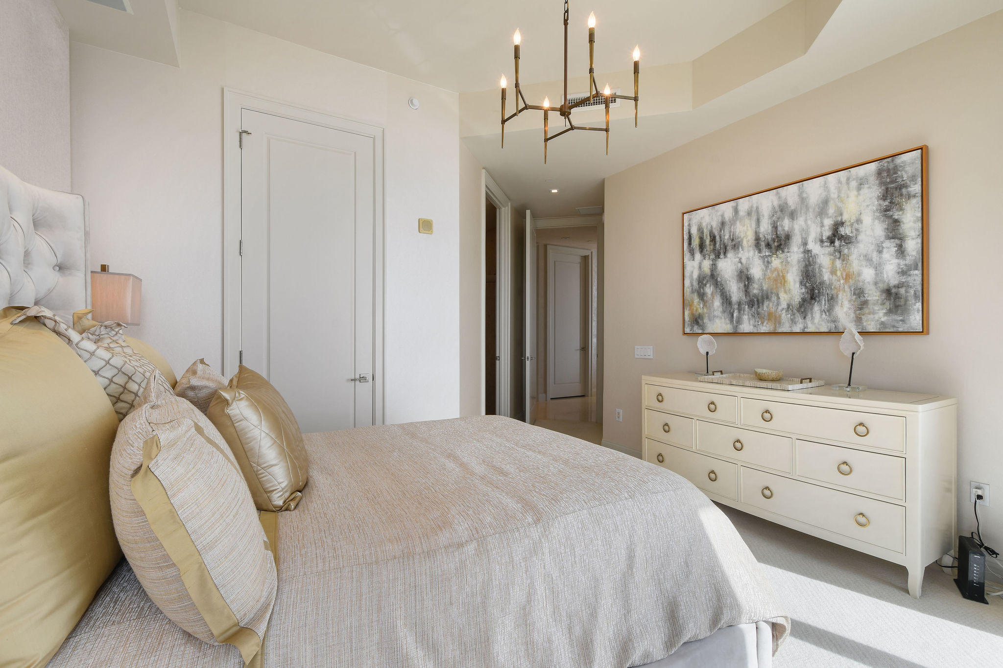 2700 North Ocean Drive, Unit LPH4B Riviera Beach, FL 33404 - Photo 25 of 67 a bedroom with a bed and a dresser