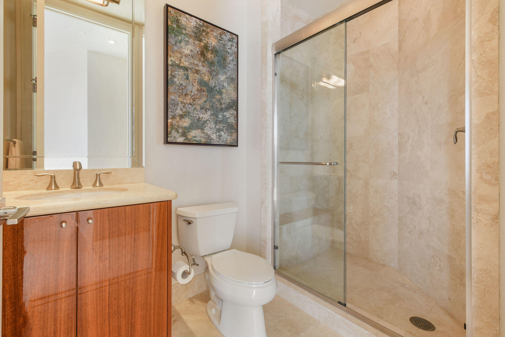 2700 North Ocean Drive, Unit LPH4B Riviera Beach, FL 33404 - Photo 26 of 67 a bathroom with a shower sink vanity mirror and toilet