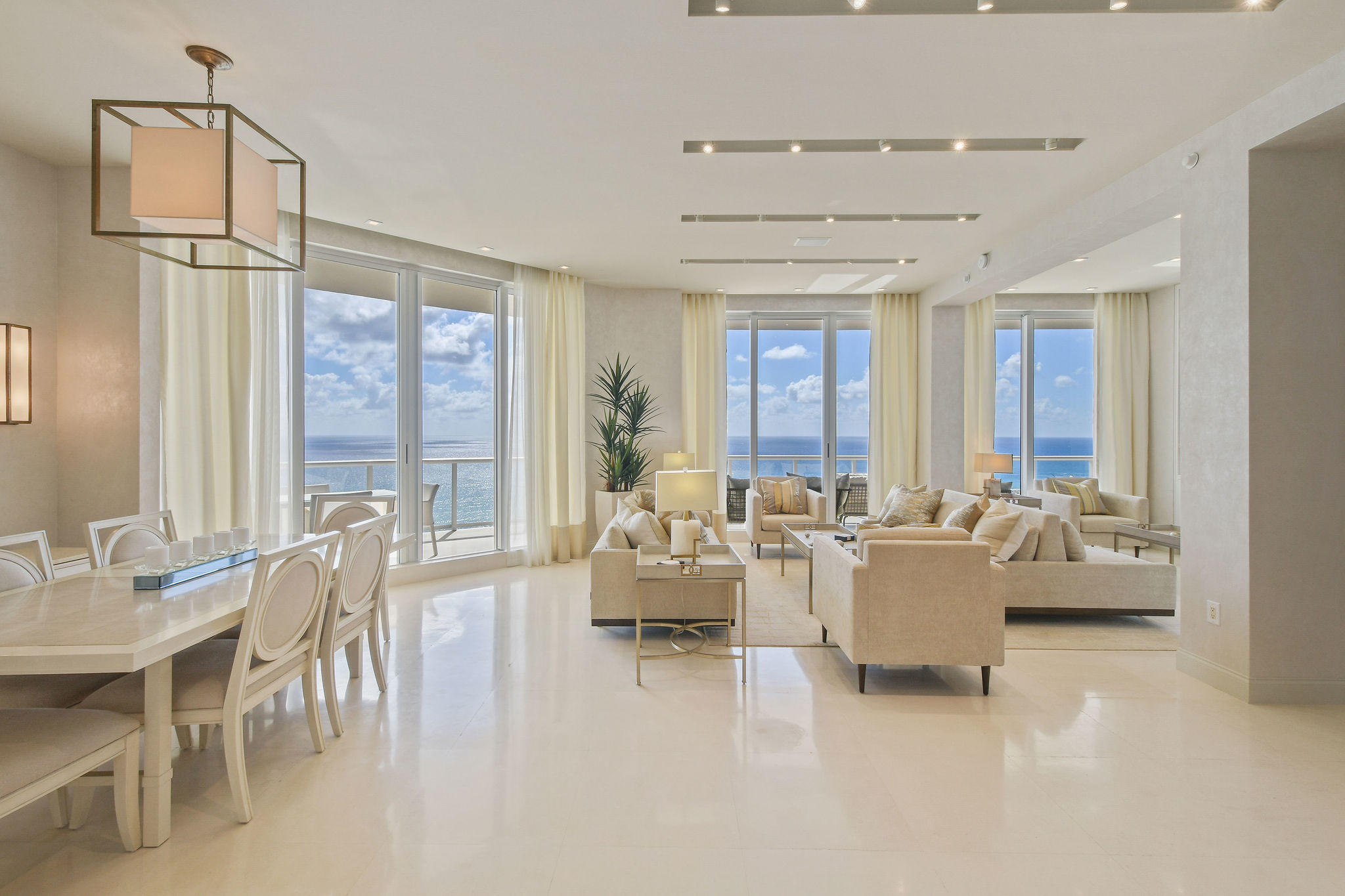 2700 North Ocean Drive, Unit LPH4B Riviera Beach, FL 33404 - Photo 4 of 67 a living room with furniture and a large window