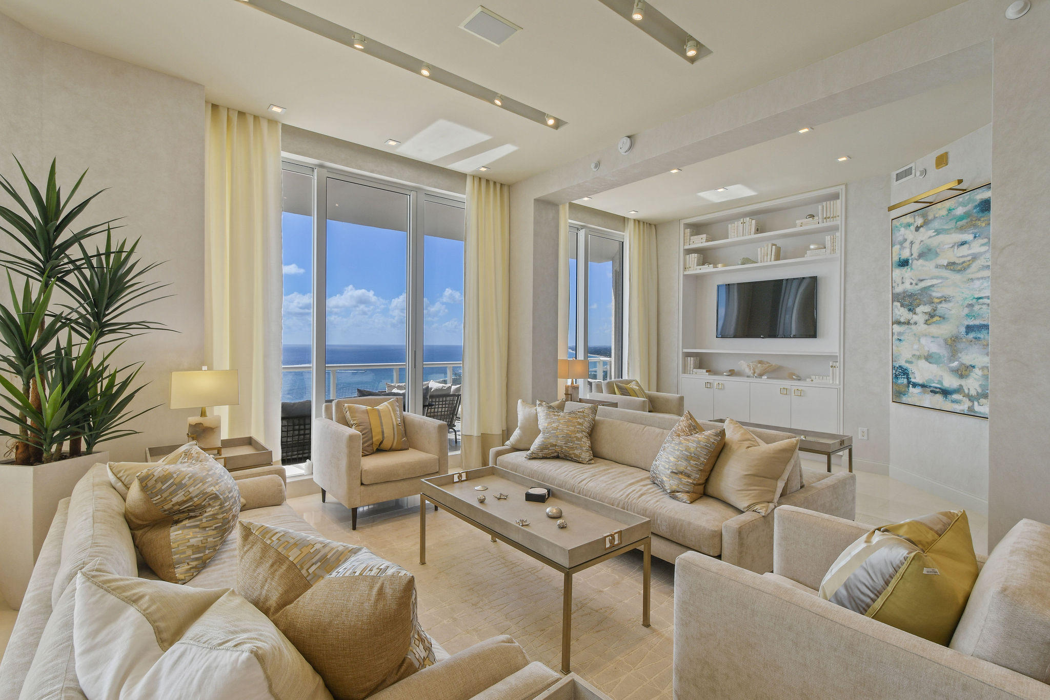 2700 North Ocean Drive, Unit LPH4B Riviera Beach, FL 33404 - Photo 5 of 67 a living room with furniture and a large window