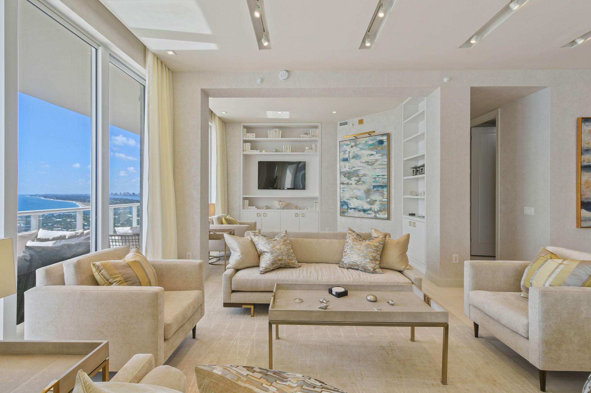 2700 North Ocean Drive, Unit LPH4B Riviera Beach, FL 33404 - Photo 6 of 67 a living room with furniture and a large window