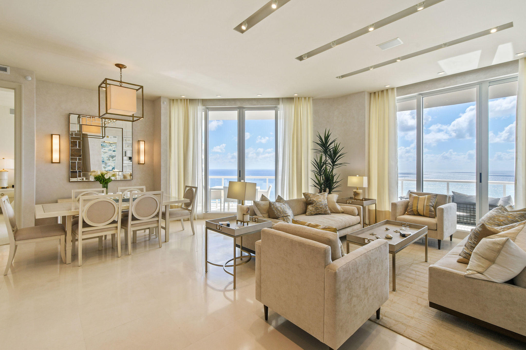 2700 North Ocean Drive, Unit LPH4B Riviera Beach, FL 33404 - Photo 8 of 67 a living room with furniture and large windows