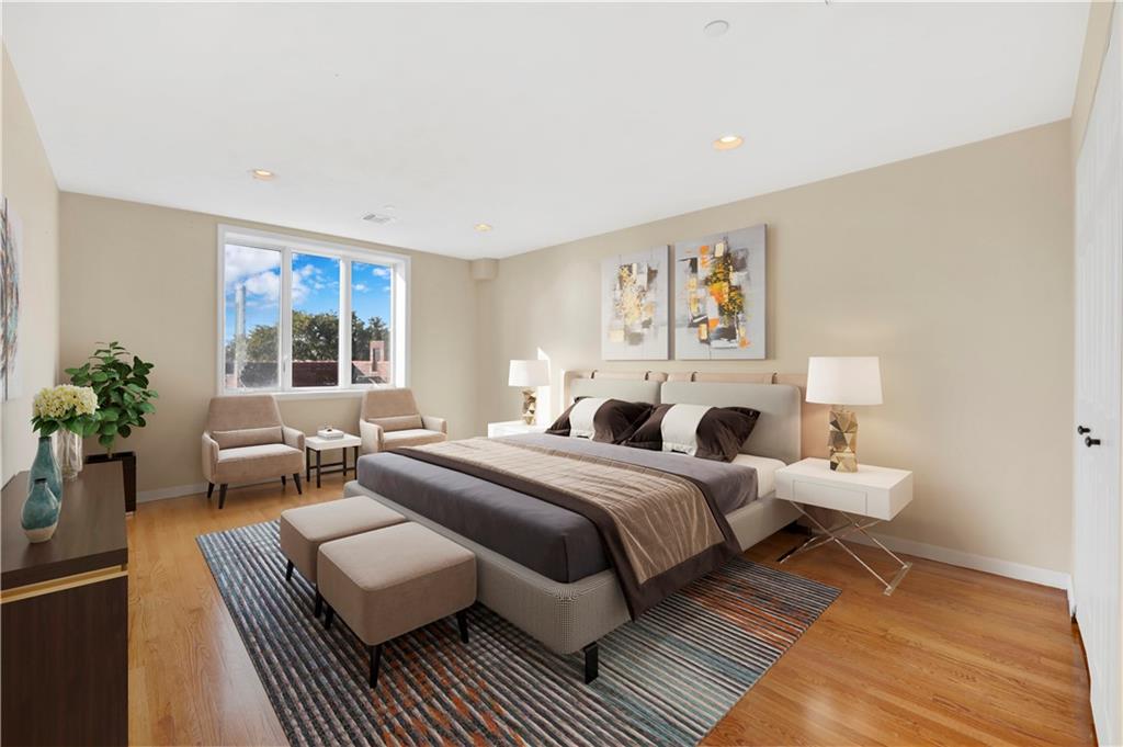 52 92nd Street, Unit 7C Brooklyn, NY 11209 - Photo 11 of 22 a bedroom with a bed and a couch