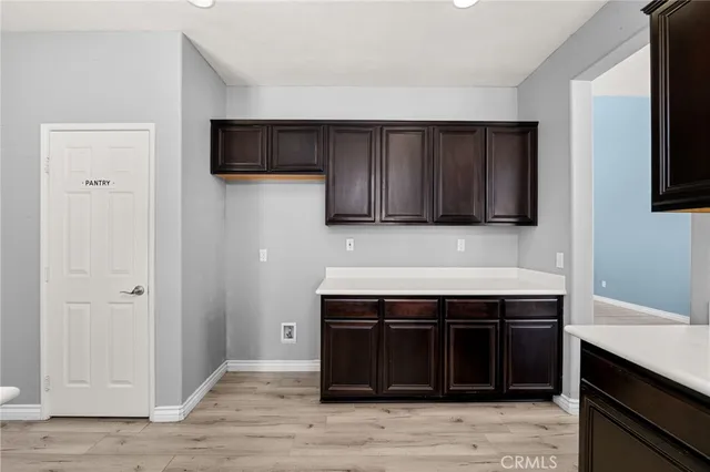 a kitchen with stainless steel appliances granite countertop a stove and a microwave