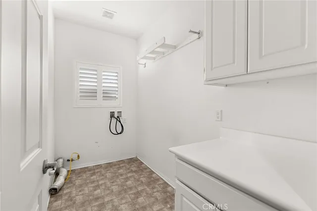 a bathroom with a granite countertop sink and vanity