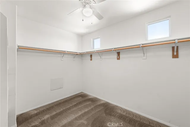 a view of a room with racks on the wall