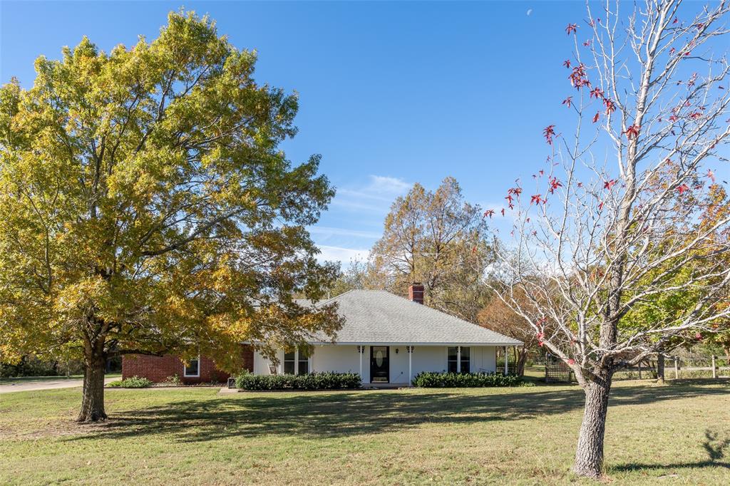 1904 Hash Road Lancaster, TX 75146 - Photo 1 of 1 View of front facade featuring a front lawn