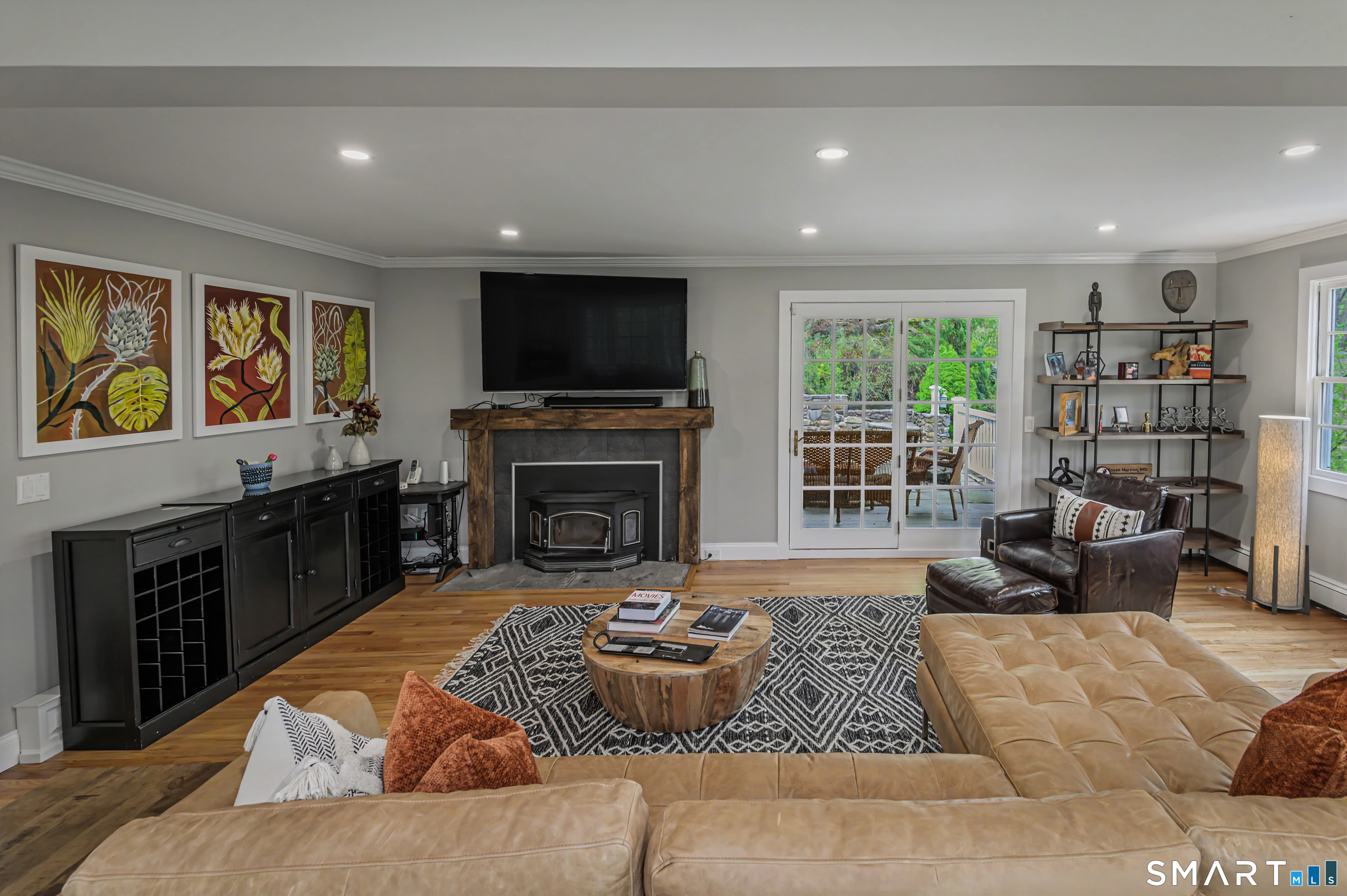 16 Twixt Hills Road Ridgefield, CT 06877 - Photo 5 of 25 a living room with furniture and a fireplace