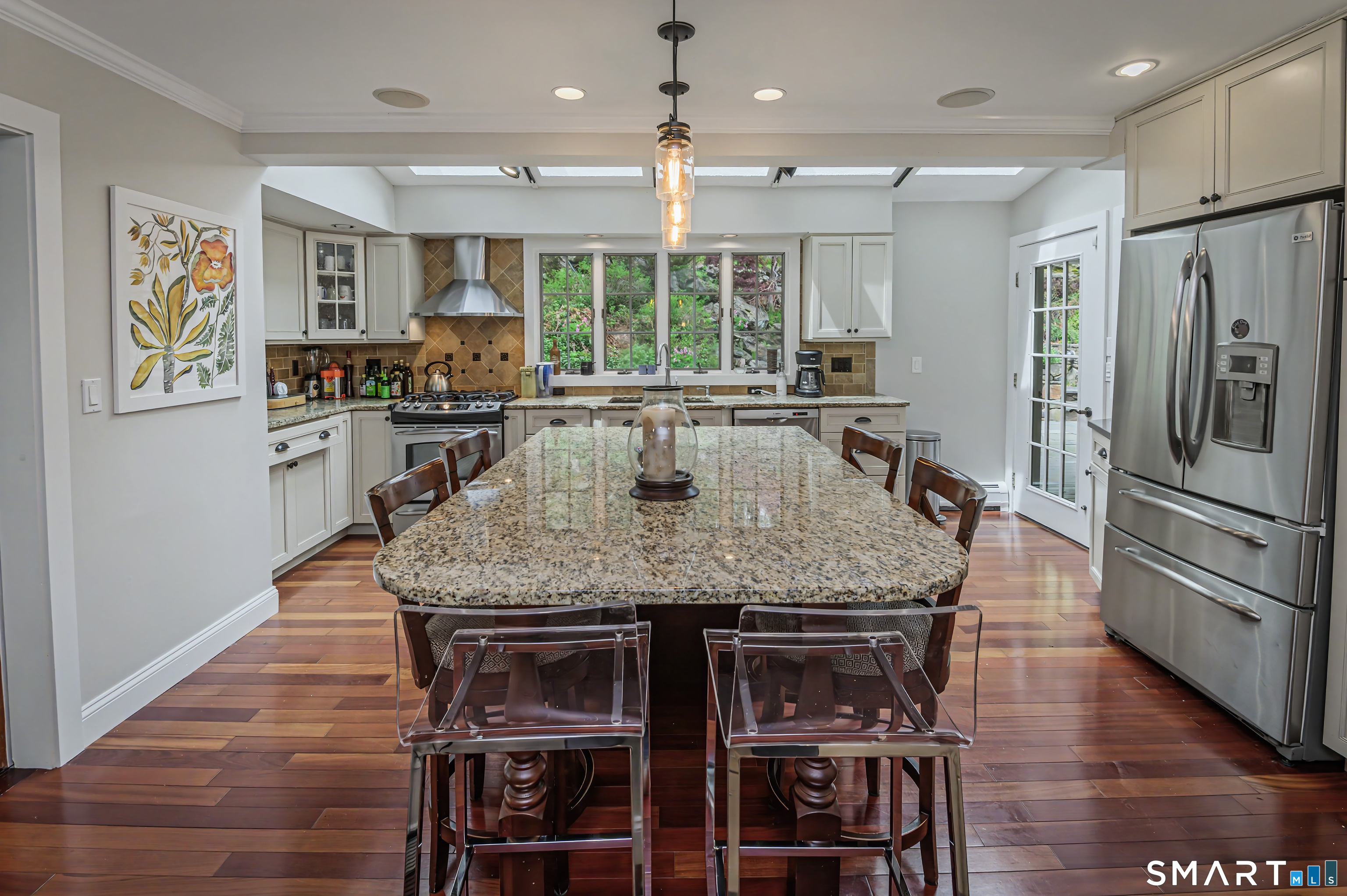16 Twixt Hills Road Ridgefield, CT 06877 - Photo 7 of 25 a kitchen with stainless steel appliances granite countertop a kitchen island a stove and a refrigerator
