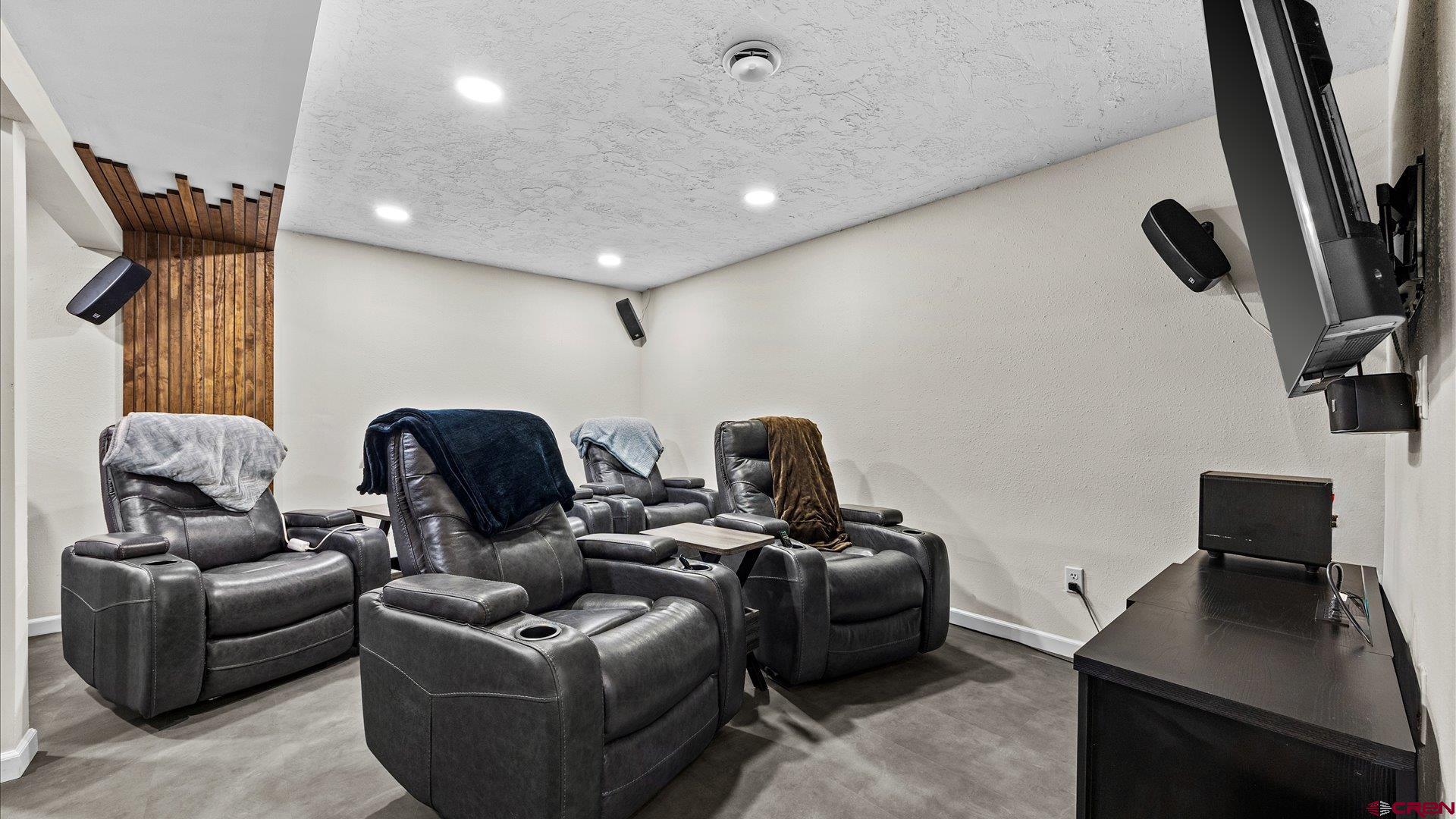 1761 G Road Delta, CO 81416 - Photo 19 of 43 a living room with furniture and a flat screen tv