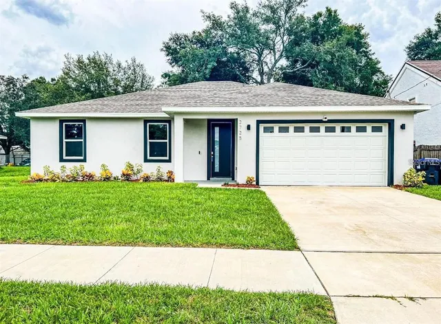 a front view of house with yard