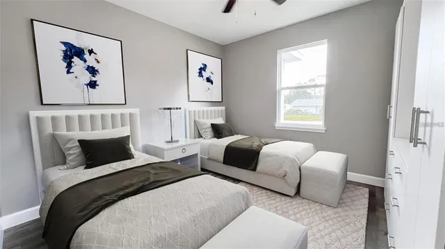 a bedroom with furniture and a window