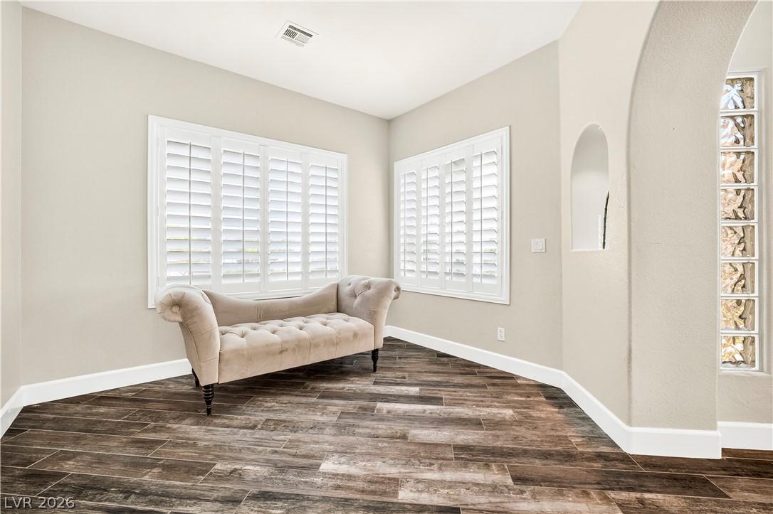 1135 Calico Ridge Drive Henderson, NV 89011 - Photo 10 of 86 Plantation shutters adorn the windows in this versatile, well-lit bonus room.