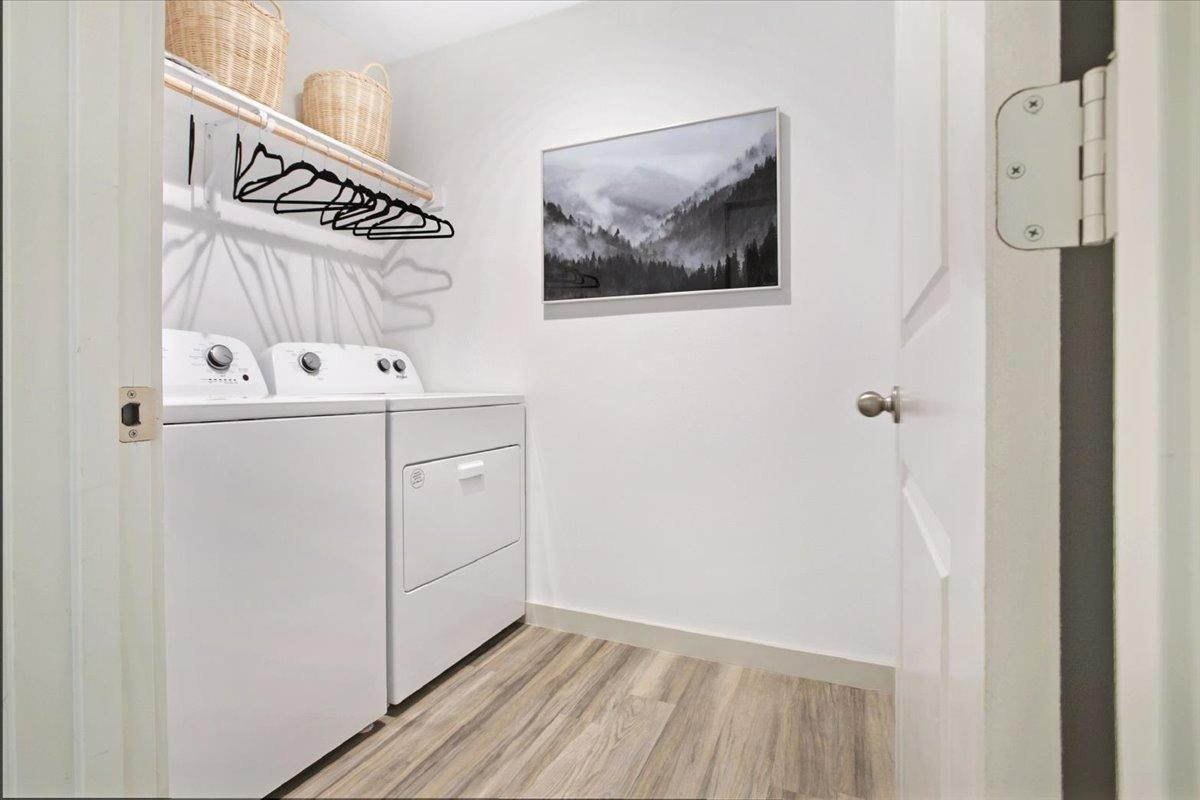 7415 8th Street Lubbock, TX 79416 - Photo 13 of 22 a view of utility room with washer and dryer