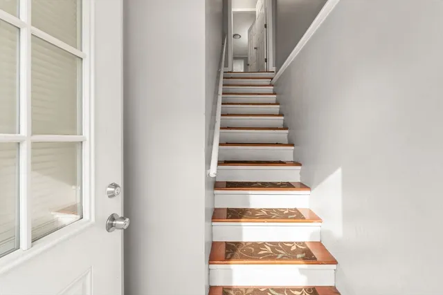 a view of entryway with a front door