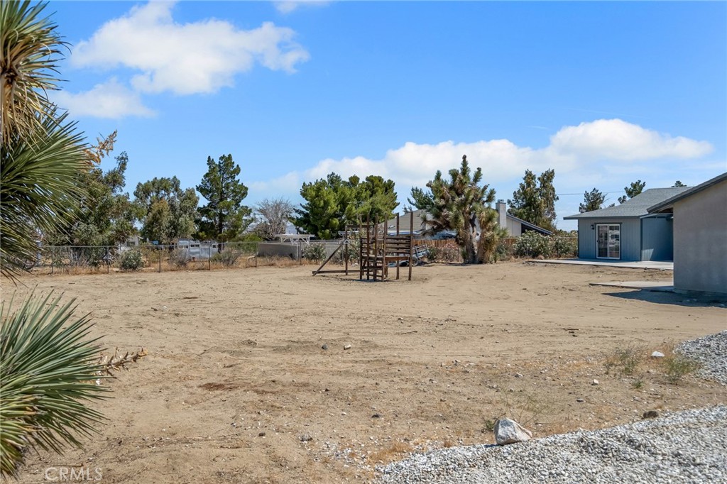 12736 Oasis Road Pinon Hills, CA 92372 - Photo 32 of 33 a view of backyard with patio