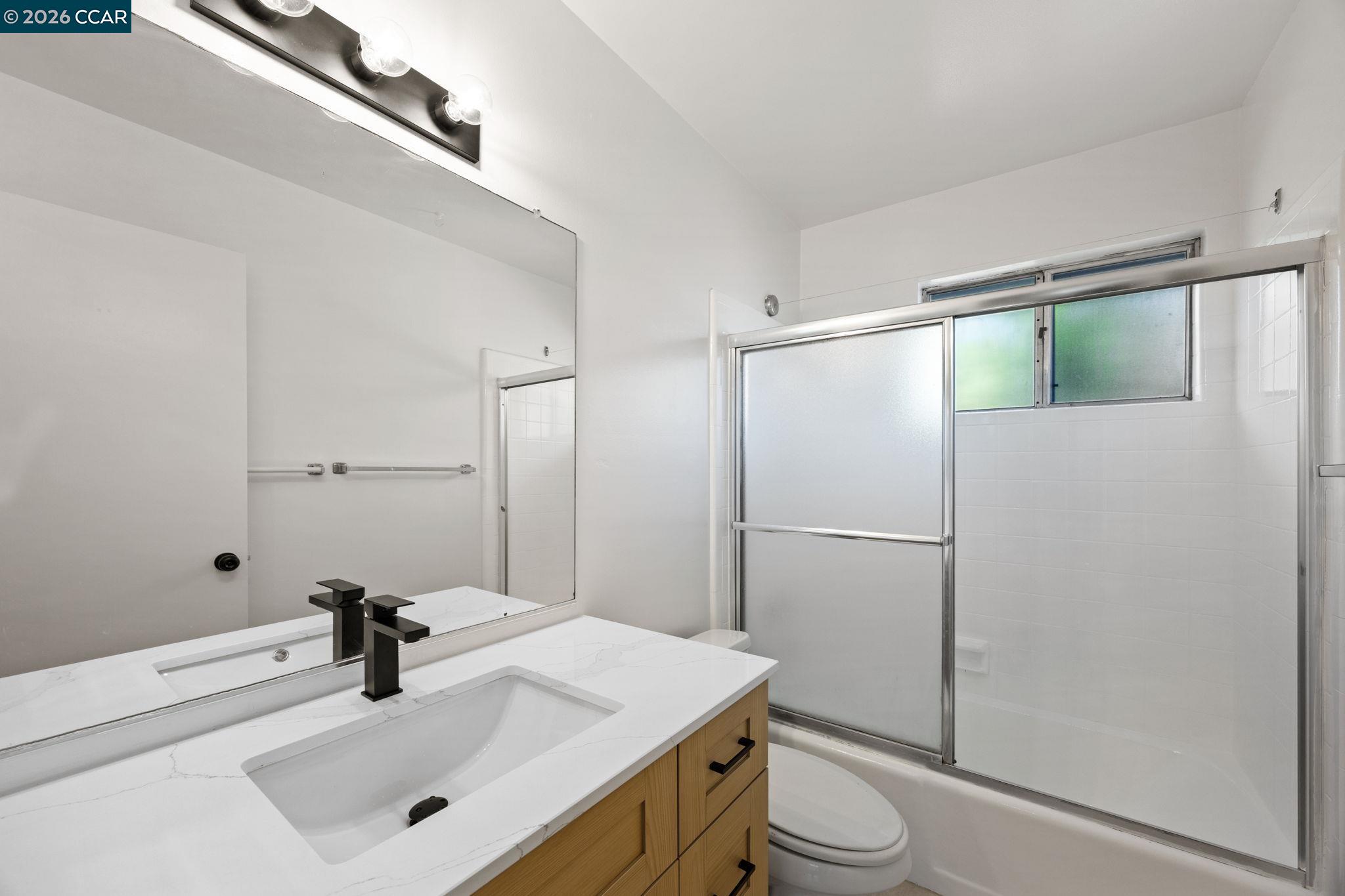 36 Miramonte Drive Moraga, CA 94556 - Photo 16 of 29 a bathroom with a sink toilet and shower