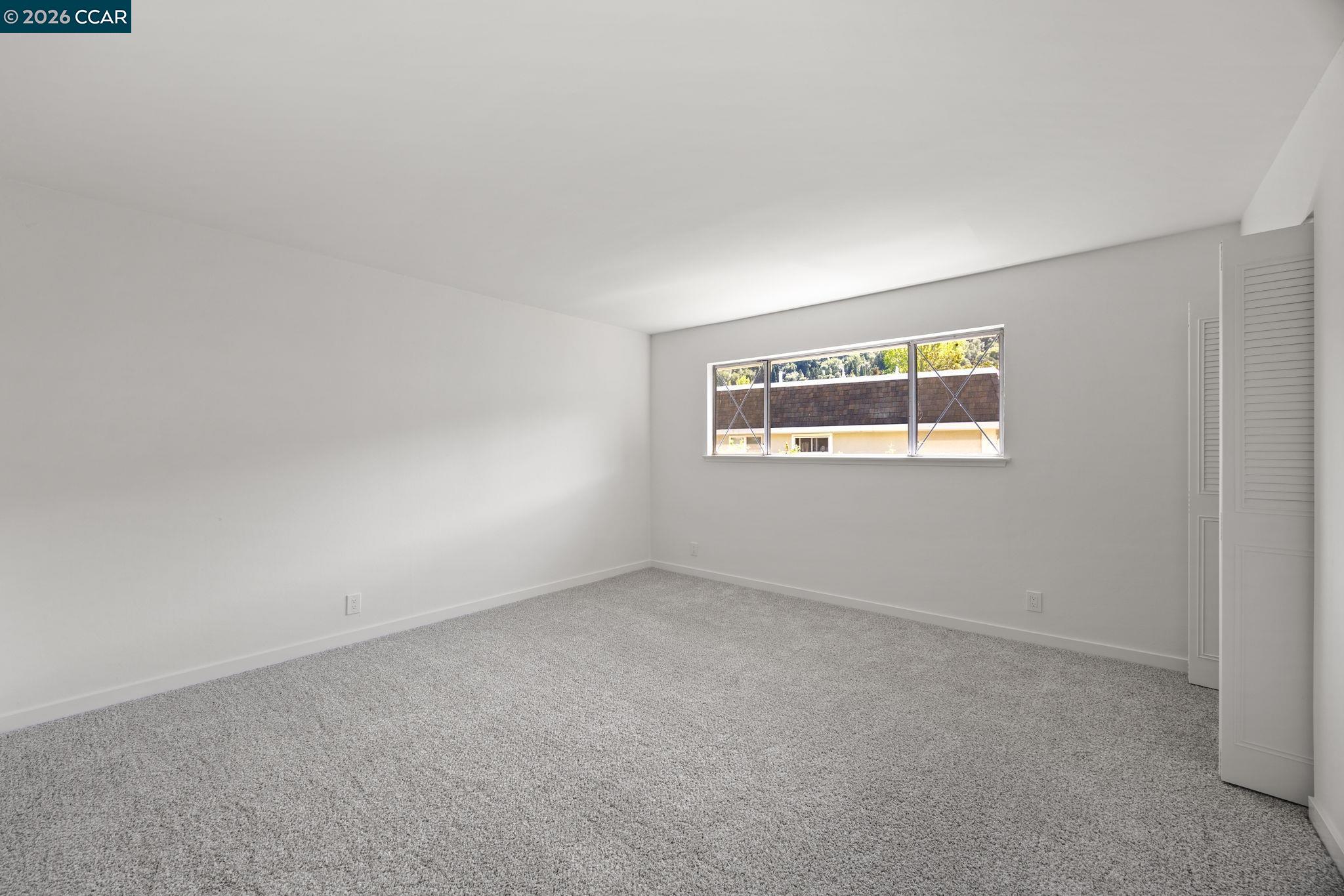 36 Miramonte Drive Moraga, CA 94556 - Photo 18 of 29 an empty room with a window