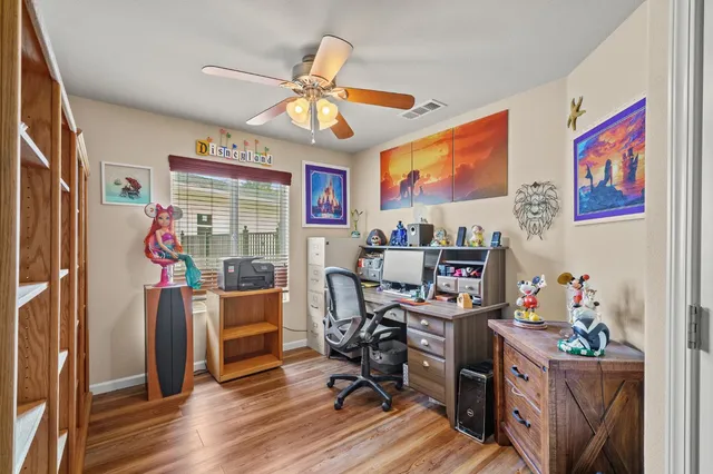 a view of a storage room with shelves dryer and racks