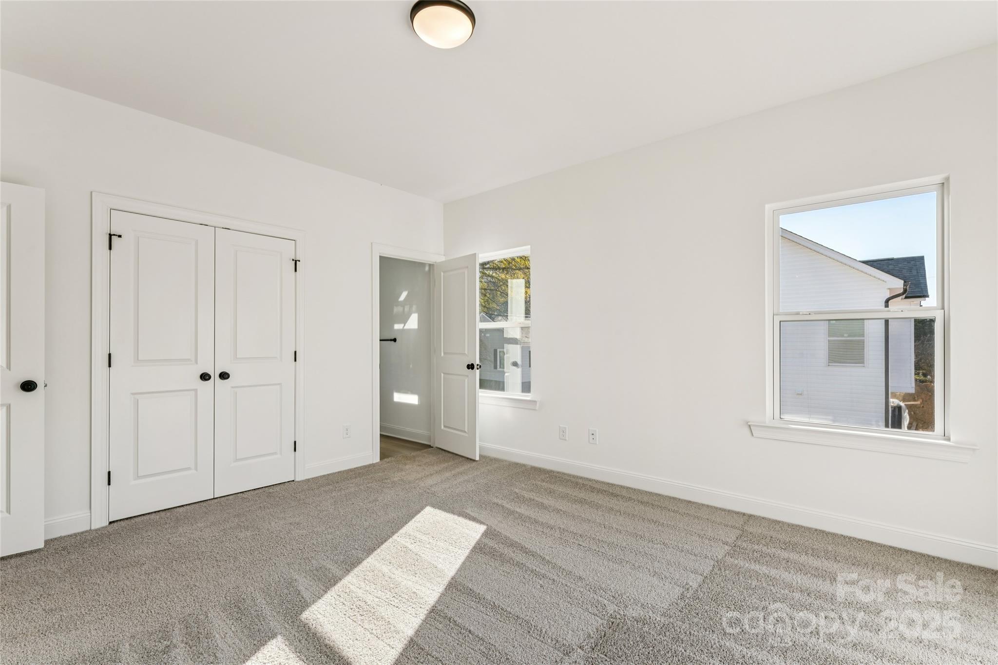 400 South Spargo Street Dallas, NC 28034 - Photo 17 of 26 a view of an empty room with window and wooden floor